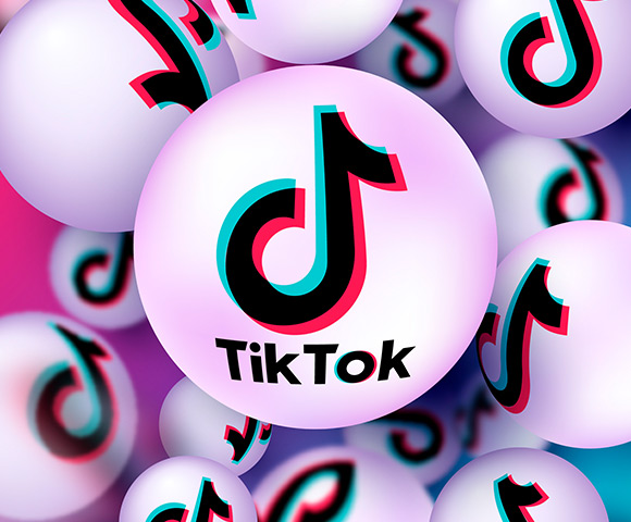 Ilustração de elemento redondo e branco com o logo do aplicativo TikTok